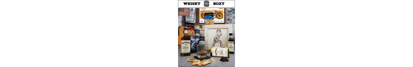 Bedny s obsahem premiovych whisky a karikaturou na viku bedny
